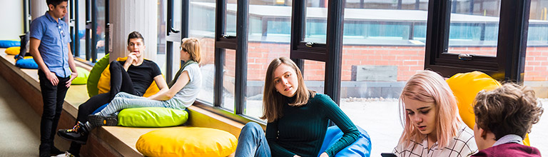 Students relaxing in a social space