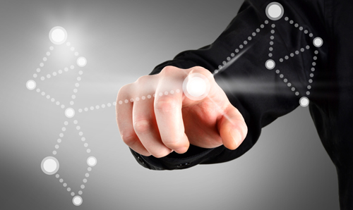 Hand touching a transparent touch screen